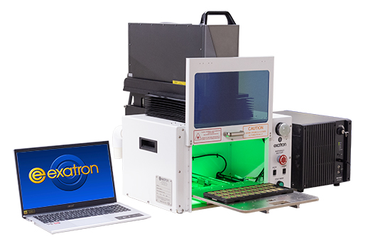 a model 615 laser enclosure with door open and tooling tray extended fitted with a Keyence laser marker with included laptop